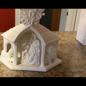 Ceramic Nativity Scene with tea light candle included.